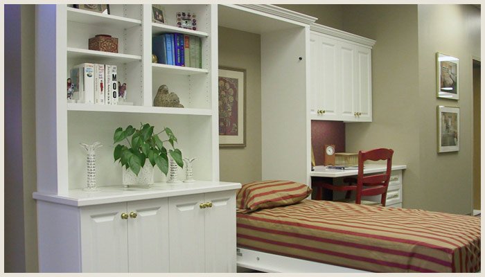 wall bed with white custom cabinetry